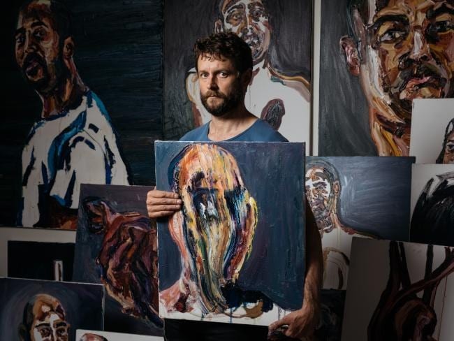 Ben Quilty with Sukumaran's paintings (Campbelltown Arts Centre)